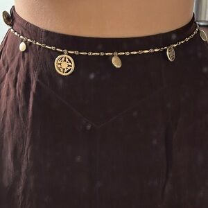 Gold chain belt with tortoiseshell charms